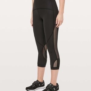 black lululemon asymmetrical crop leggings